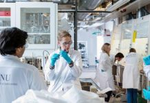 researchers in a labaratory