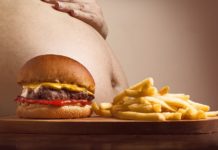 Norwegians Eat Less Red Meat to Fight Against Climate Change A hamburger and potato chips